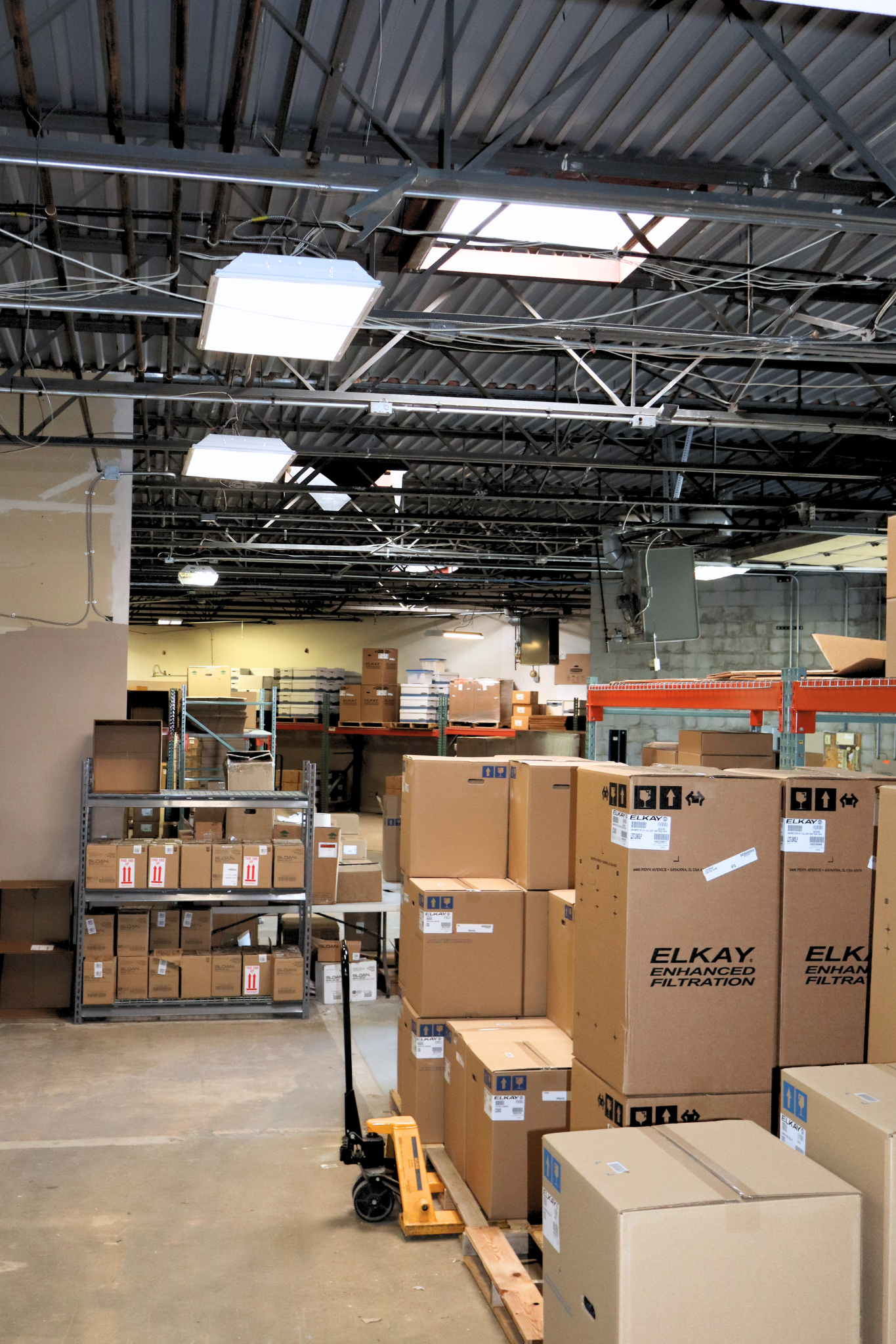Elkay inventory stacked on pallets in the Category Five Technologies warehouse