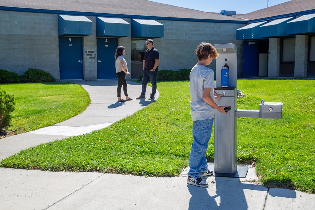 Commercial drinking fountain installed in a school or office hallway