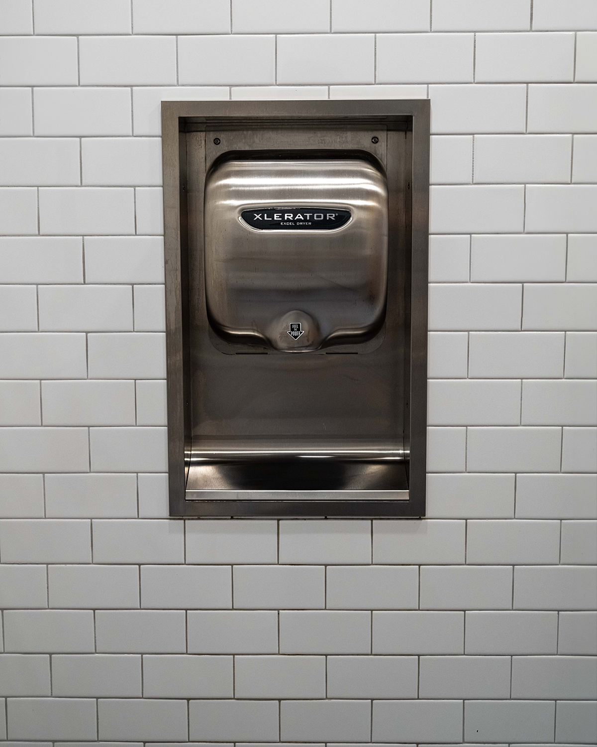 Excel XLERATOR hand dryer at Hot Table restaurant commercial restroom