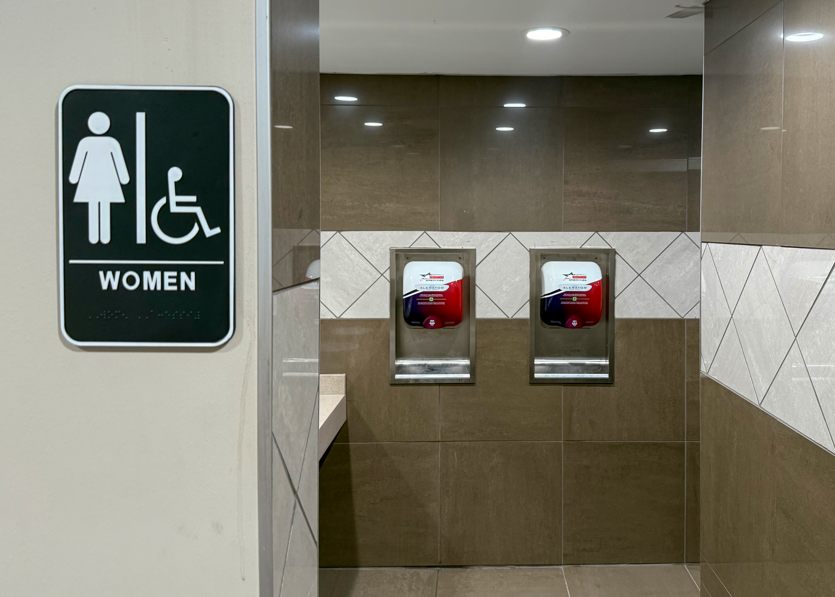 Commercial hand dryer installation in commercial restroom