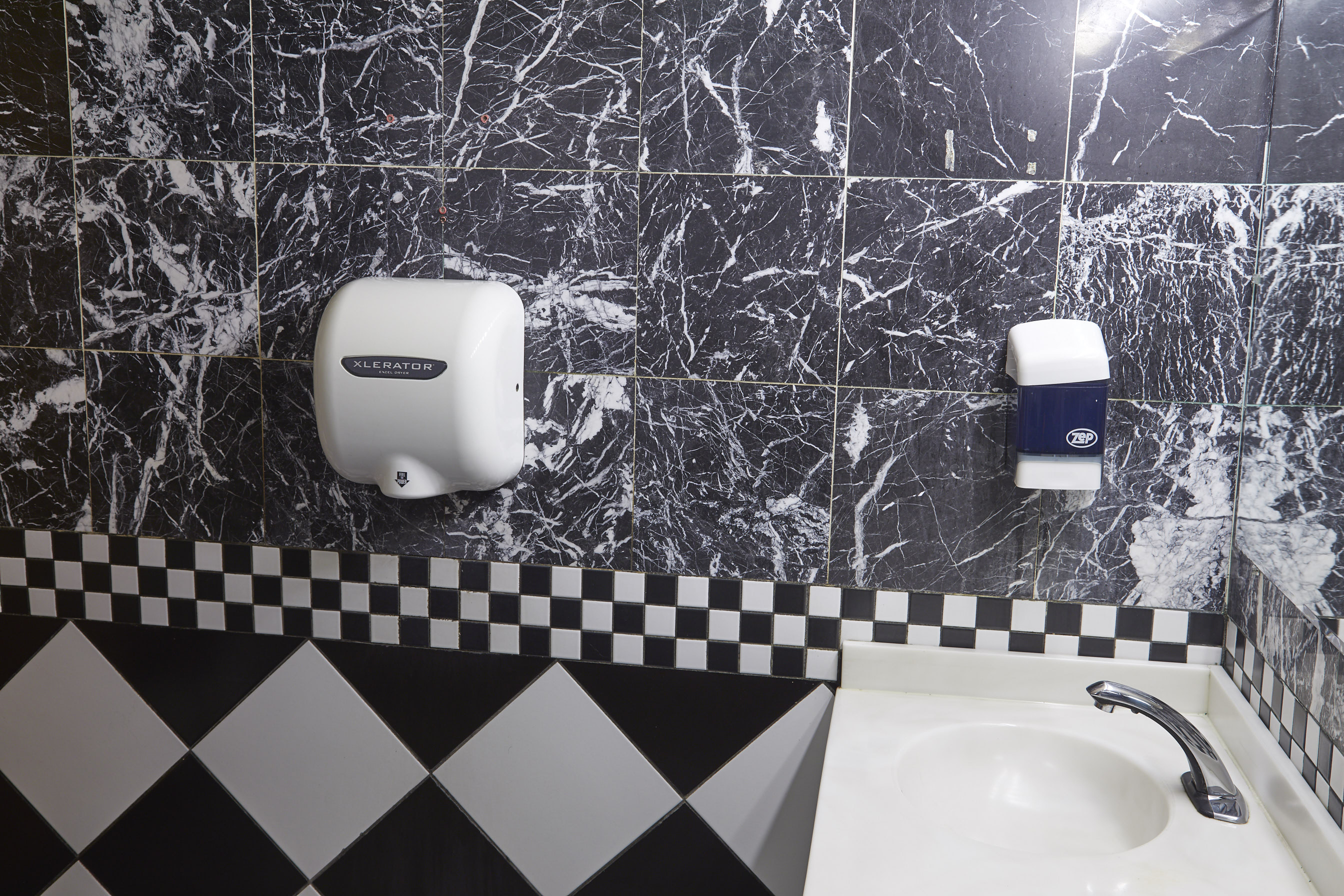 Excel XLERATOR hand dryer installed at Red Rose commercial restroom